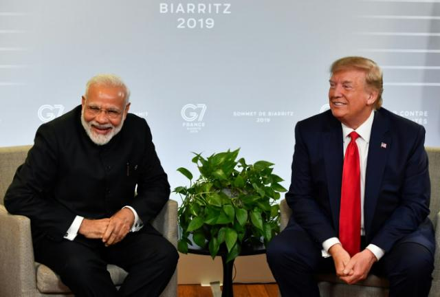 In show of bond, Trump to join Modi in mass Houston rally