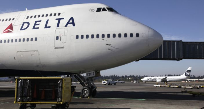 US fines Delta $50,000 for booting off 3 Muslim passengers